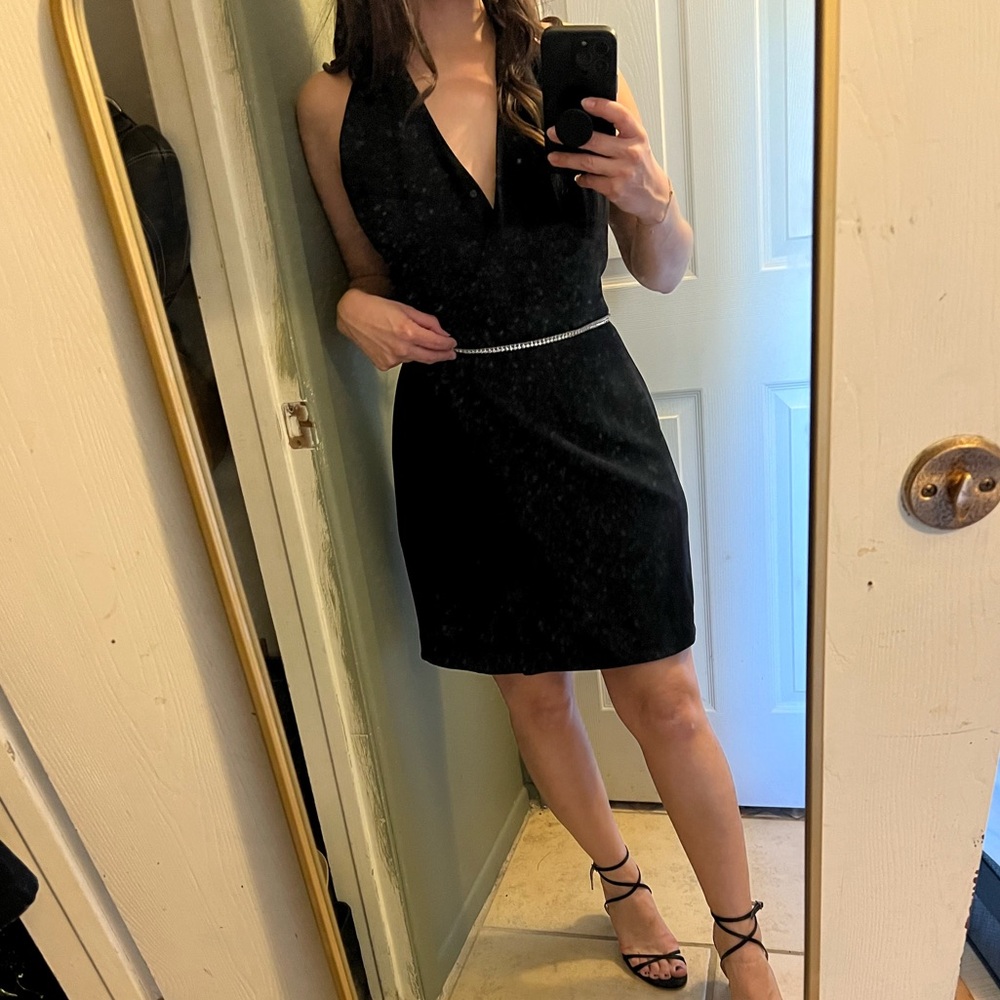 Black halter dress with rhinestone detailing